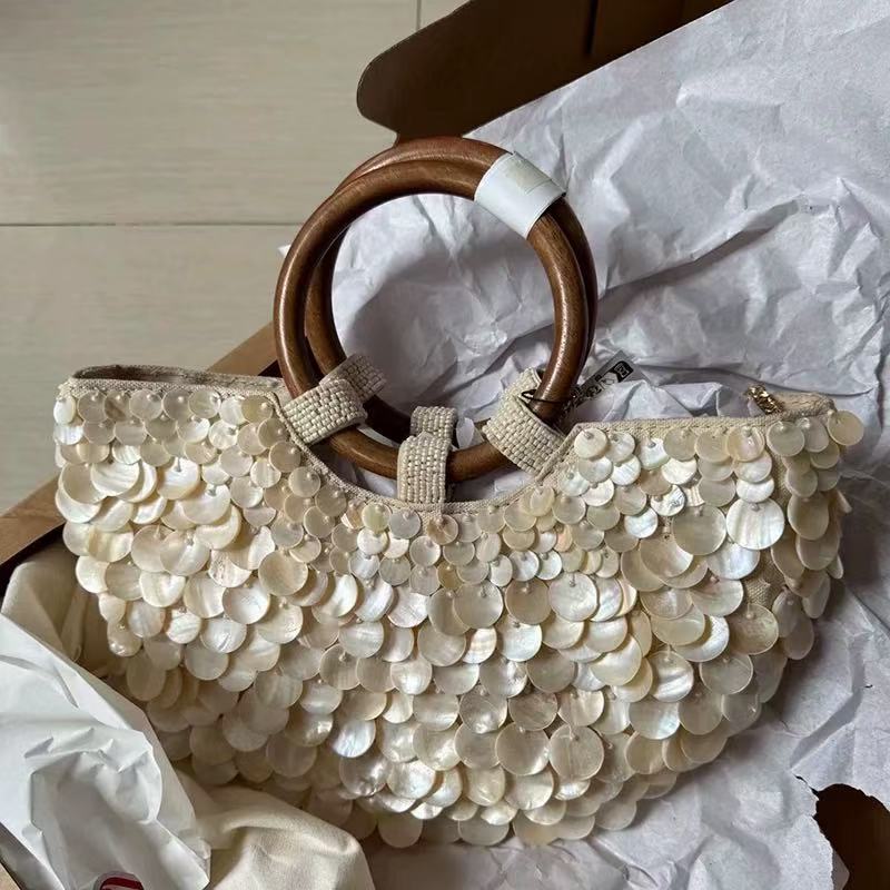 Handmade natural shell pieces handbag