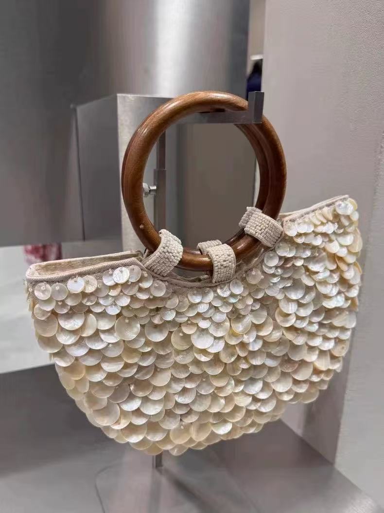 Handmade natural shell pieces handbag